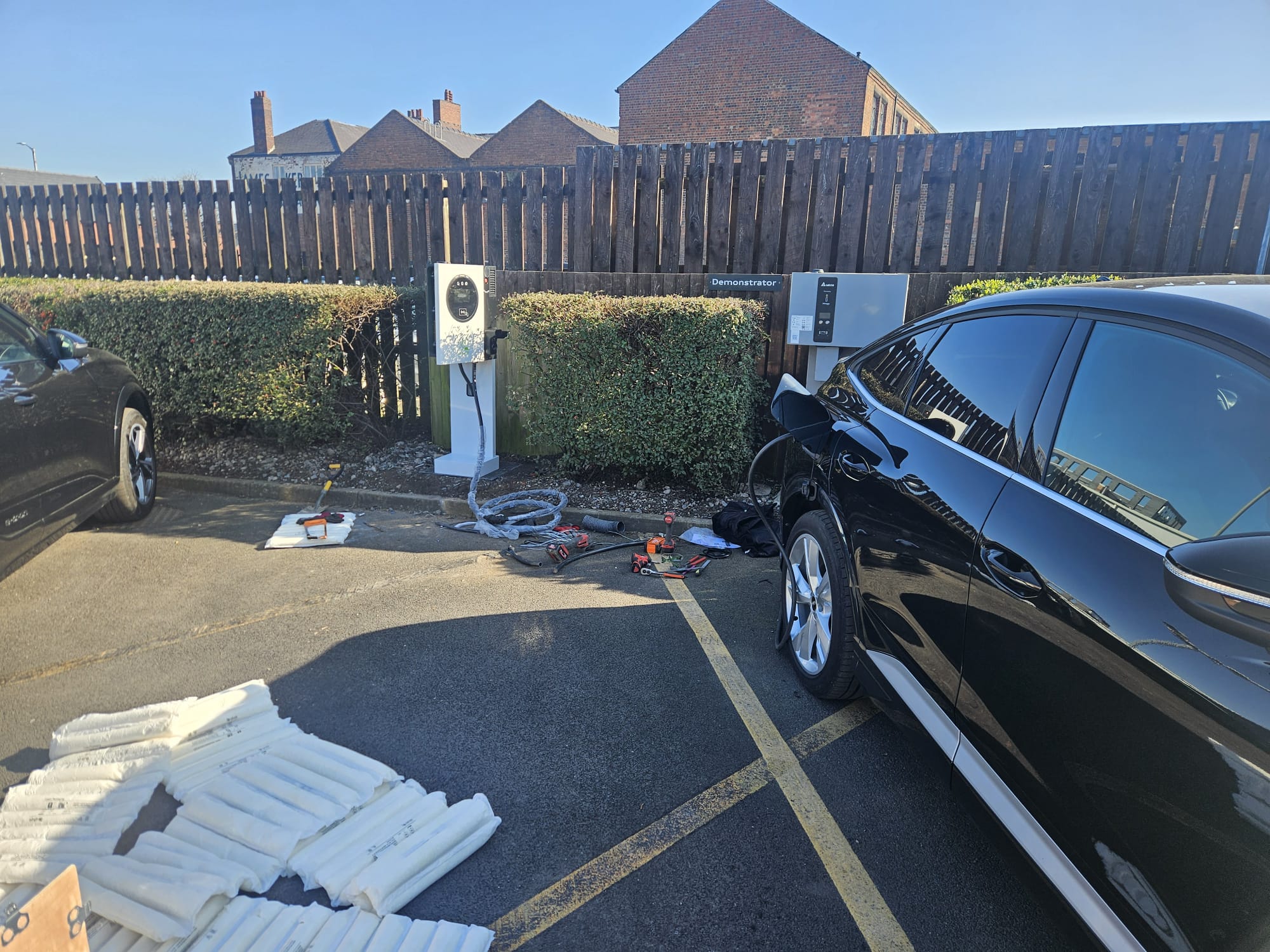 Omega charger at Audi dealership charging bay